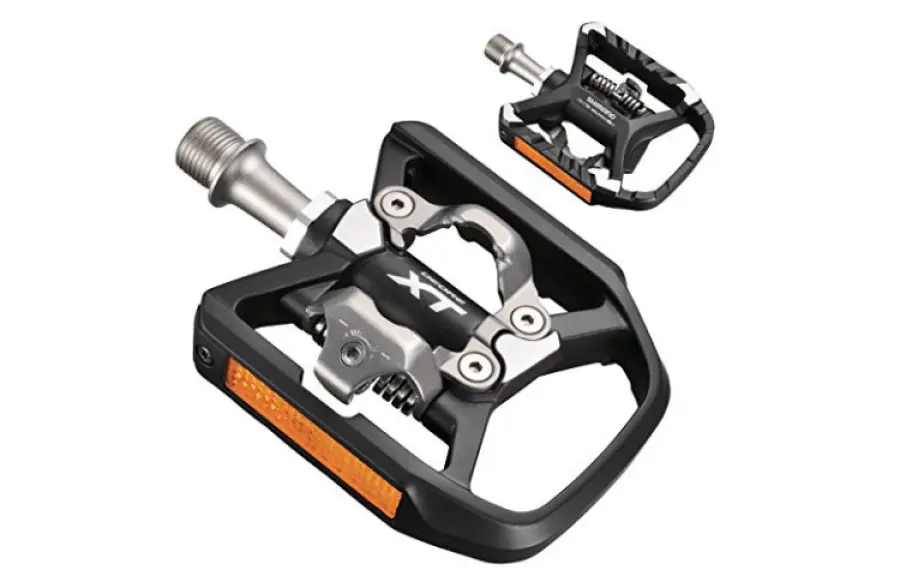 Pedali Sgancio Rapido con Catarifrangenti: Caratteristiche e Recensione di un modello perfetto per Cicloturismo e MTB