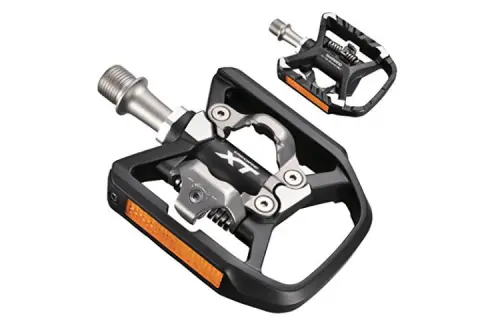 Pedali Sgancio Rapido con Catarifrangenti: Caratteristiche e Recensione di un modello perfetto per Cicloturismo e MTB