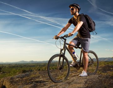 Young man riding mountain bike