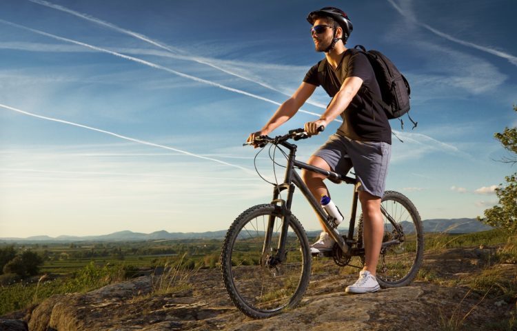 Young man riding mountain bike